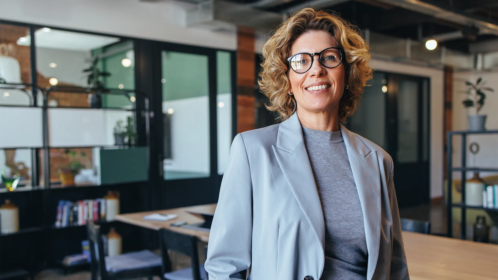 Women dresses in business clothes posing for a photo
